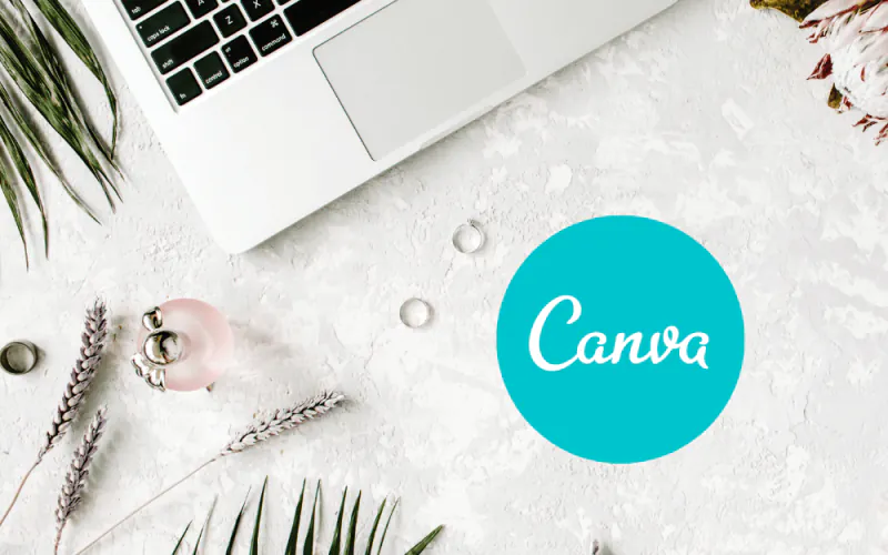 לוגו Canva על שולחן עבודה לבן